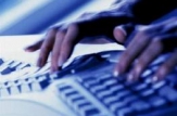 Vicedirectorul unui furnizor de servicii Internet reţinut pentru fraude informatice